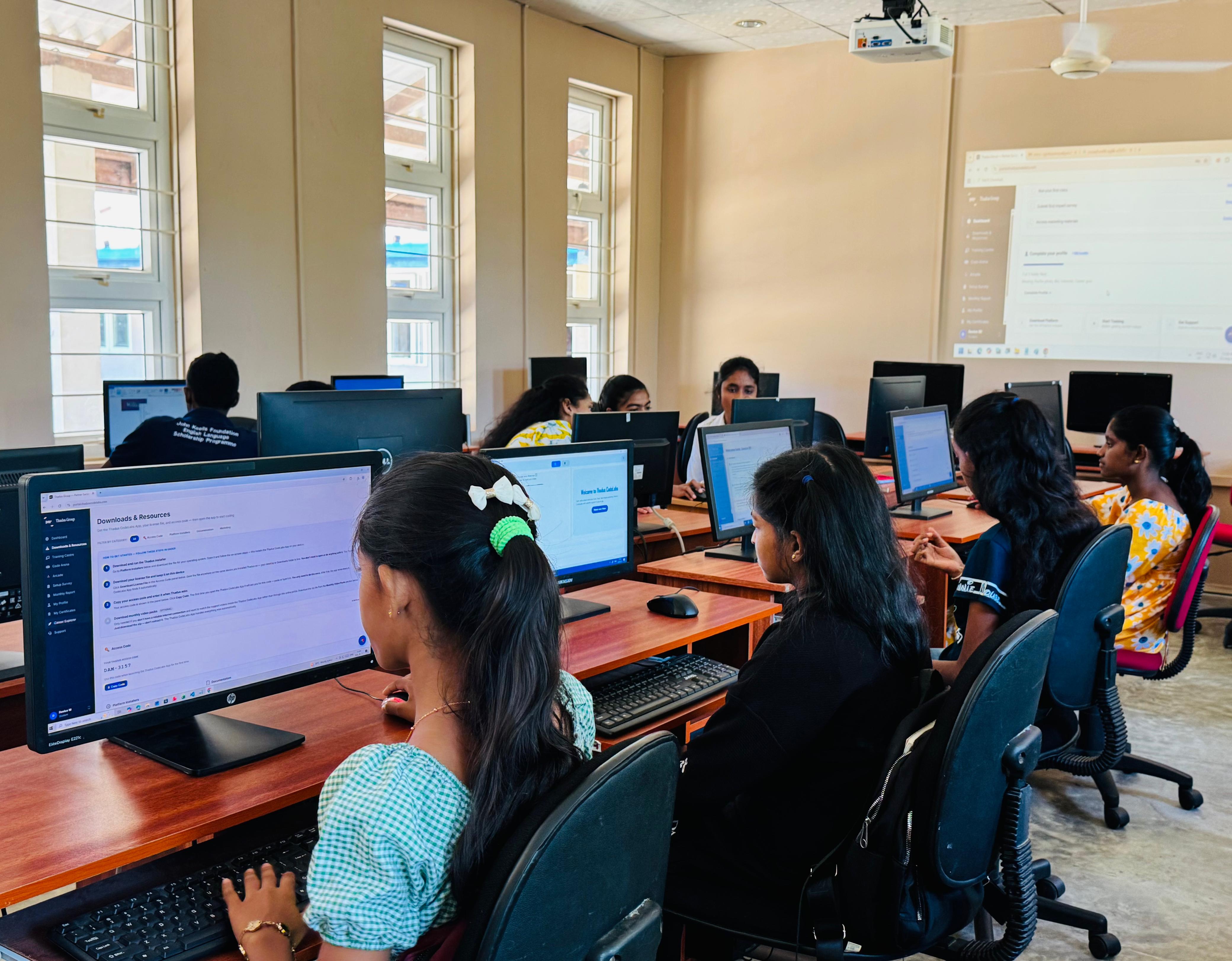 Students working at computers at a CodeLabs centre on Delft Island, Sri Lanka